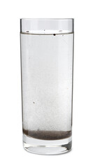 Glass with dirty water isolated on white