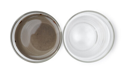 Glasses with clean and dirty water isolated on white, top view