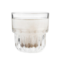 Glass with dirty water isolated on white