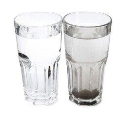 Glasses with clean and dirty water isolated on white