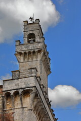 Keep of the Palazzo Comunale-Town Hall and its machicolated galleries, topped by the metal figure of a rampant dragon. Montepulciano-Tuscany-Italy-053