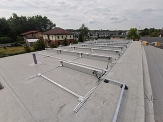 The structure on the roof for installing solar panels was built using a non-invasive method, and...