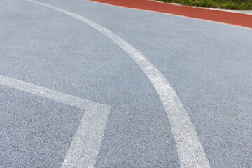 White lines and contrasting colors create an abstract view of sports ground