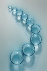 Abstract blue spheres in curved pattern with soft reflections