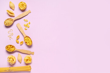 Wooden spoons with different types of raw tasty pasta on pink background