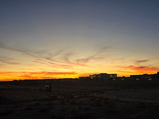 Sunset over Desert and Building