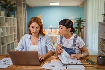 multicultural female friends discussing and working or teaching at home