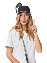 Young blonde golfer in studio having some great idea, concept of creativity.