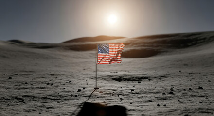 A waving american flag planted on a gray, rocky surface under a bright light in a desolate landscape