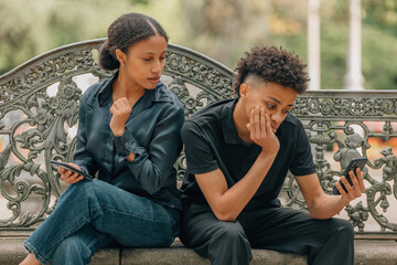 couple spying on cell phone, suspicious