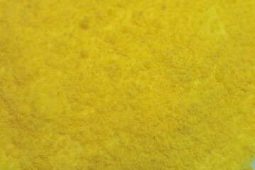 A mustard color texture. Complex with many details