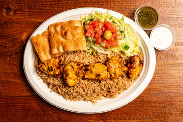 Grilled chicken with rice and salad