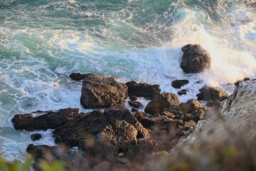 Strong waves wash up on the shores of Malibu from Point Dume, just up the Pacific Coast Highway...
