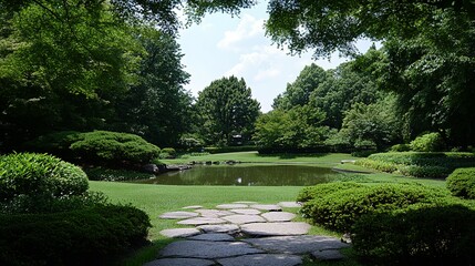 Well-maintained garden with a pond and stone pathway.