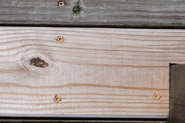 Knot in board in wood deck