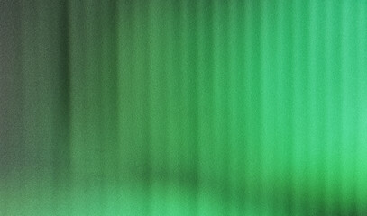 Grainy, soft focus background with a spectrum of green shades
