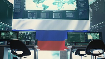Empty governmental hacking room with Russian flag on big screen, highlighting cyber terror and...