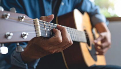 Fototapeta premium Man Playing Acoustic Guitar Close Up