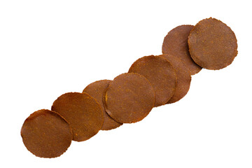 Fermented soybean discs, known as “Thua Nao,” a traditional Thai seasoning used to enhance...