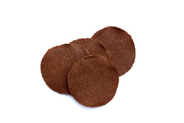 Fermented soybean discs, known as “Thua Nao,” a traditional Thai seasoning used to enhance flavor in Northern cuisine.