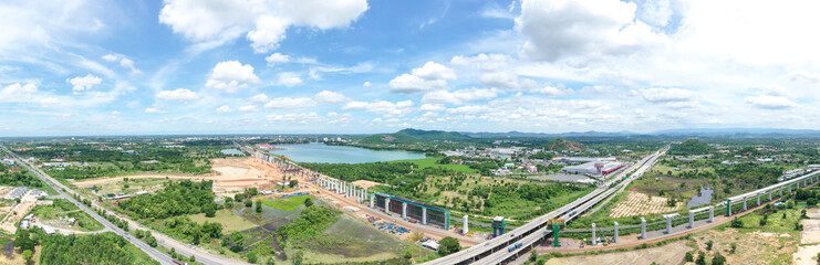 New construction site with crane and mechanical equipments on blue sky background, Infrastructure of high-speed train construction site of Chinese made FuxingHao, base from CR400AF for transportation.