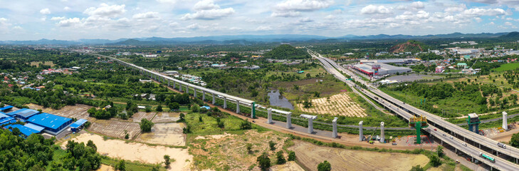 New construction site with crane and mechanical equipments on blue sky background, Infrastructure...