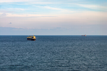 idyllic seascape with cargo ships