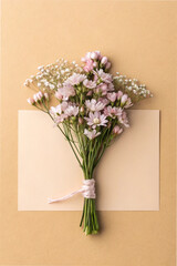Small bouquet of flowers on a beige background. pastel color.	light pink. white. copy space. text space. message space