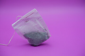 Dry Tea Bags Isolated on Colorful Surface