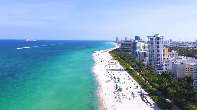 Miami Beach Florida 4K Aerial Drone Footage Over The Oceanfront. Collins Ave to South Beach on a Bright Sunny Day with Blue Skies Flying Forward. 