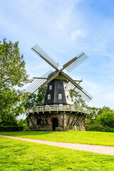 Slottsmollan historical windmill against a clear blue sky in Sweden
