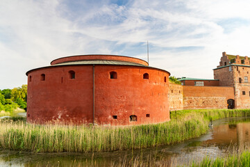 Red brick defensive tower of Malmohus Castle in Sweden