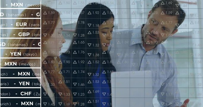 Analysts studying office laptop while reacting to transparent currency overlay updating market data