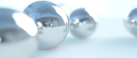 Close-up of several shiny, reflective spheres.