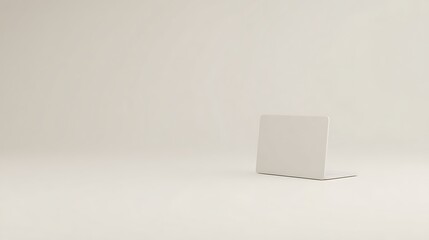 A simple white bookend against a plain backdrop.