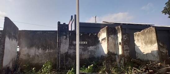 Abandoned Weathered Concrete Building Under Blue Sky
