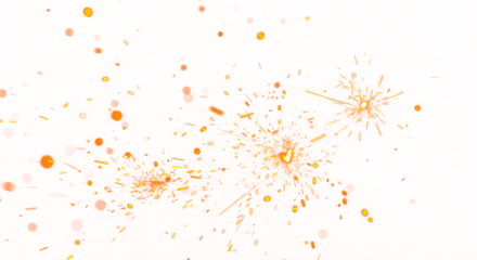 Dynamic display of vibrant orange sparks and embers in a celebratory burst.