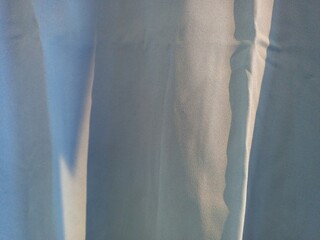 Smooth Flowing Blue Fabric Texture Background