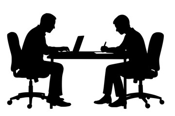 Silhouette of Two People Working Together at a Table