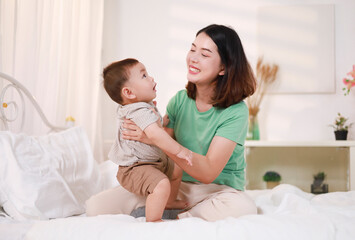 Mothers who play with their children strengthen the loving relationship between mother and child.