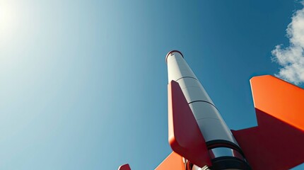 A high-angle cinematic shot of a rocket against a clear blue sky, emphasizing its clean lines and aerodynamic design, with sharp details and bright sunlight