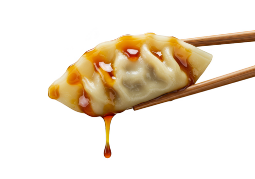 Isolated PNG Appetizing Gyoza Brown Sauce Hold in Chopsticks Cuisine