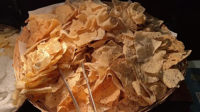 Different kind of papad served in a wedding in India