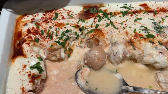 Dahi vada prepared with spices, curd and chilly powder in Kolkata, India