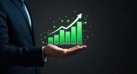 Businessman holding a glowing green bar chart with an upward arrow, symbolizing financial growth and