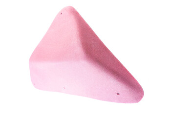 Pink textured climbing volume with geometric design, isolated on white background. Used for indoor bouldering and training on climbing walls.
