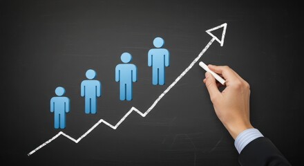 Hand drawing a rising graph with people icons on a chalkboard