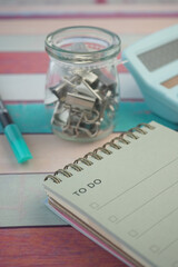Organizing tasks with a to-do list and stationery essentials