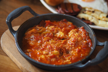 Savory turkish menemen served with bread 