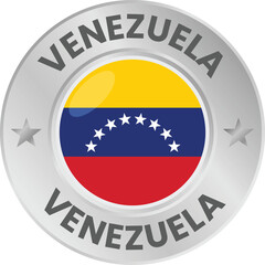 Venezuela flag in silver colored medal. National flag in metal circle emblem.